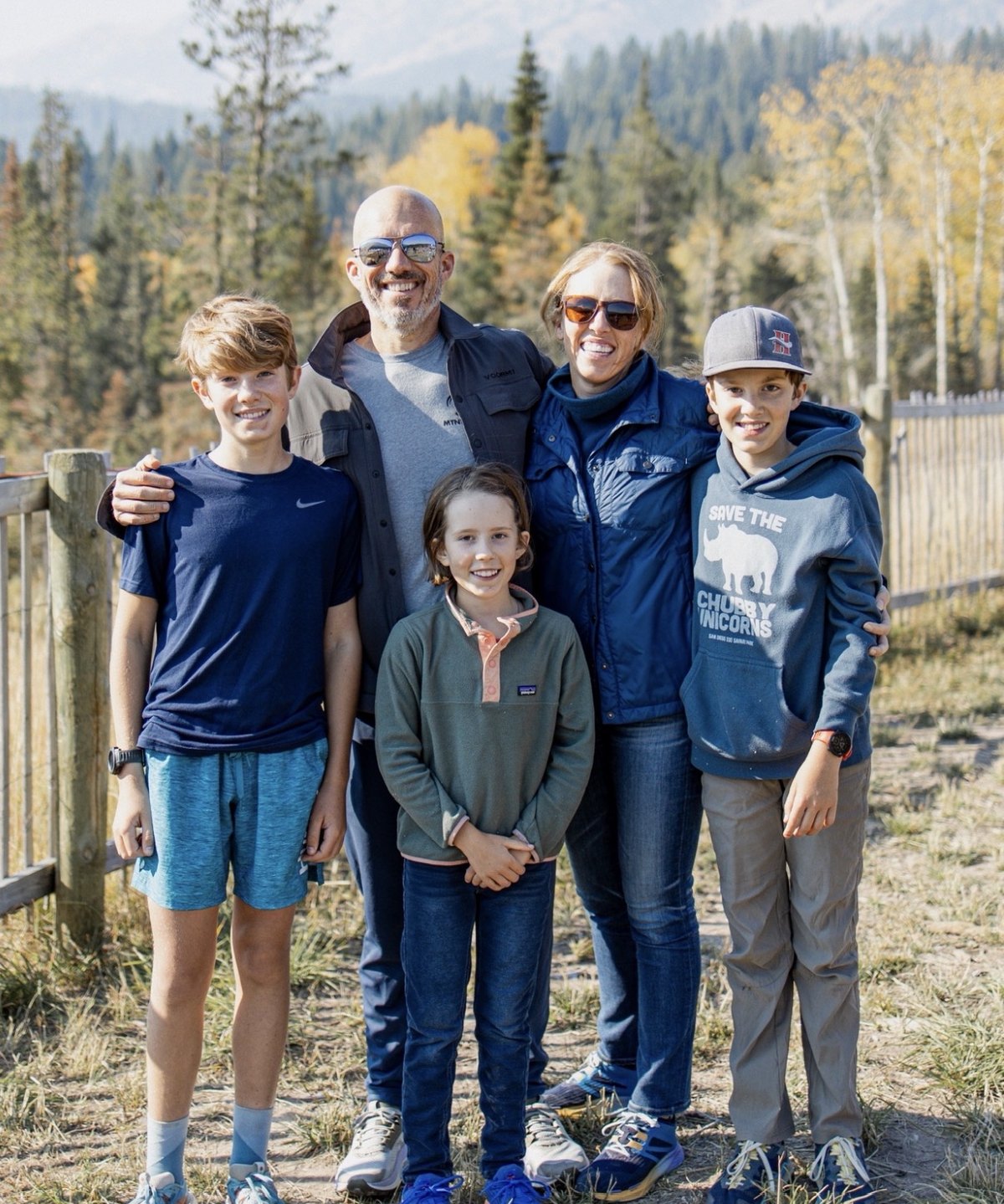 Erin Hemming with her husband and three children on a mountain trail near Bozeman, Montana
